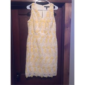 A yellow and white floral dress